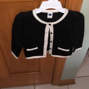 This cute navy blue and white trim sweater is from Janie and Jack.